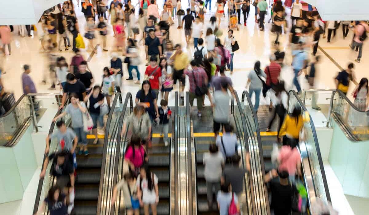 shoppers in an indoor mall