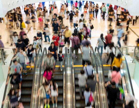 shoppers in an indoor mall