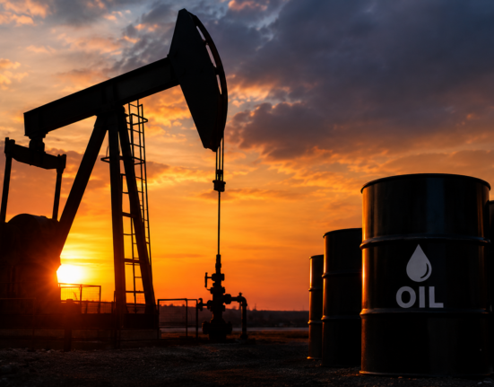 Sunset Pumpjack and Oil Barrels