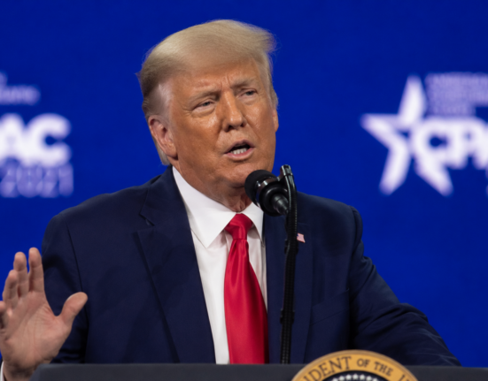 Donald Trump speaking at a conference