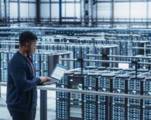 Data Center Engineer Using Laptop Computer crypto mining